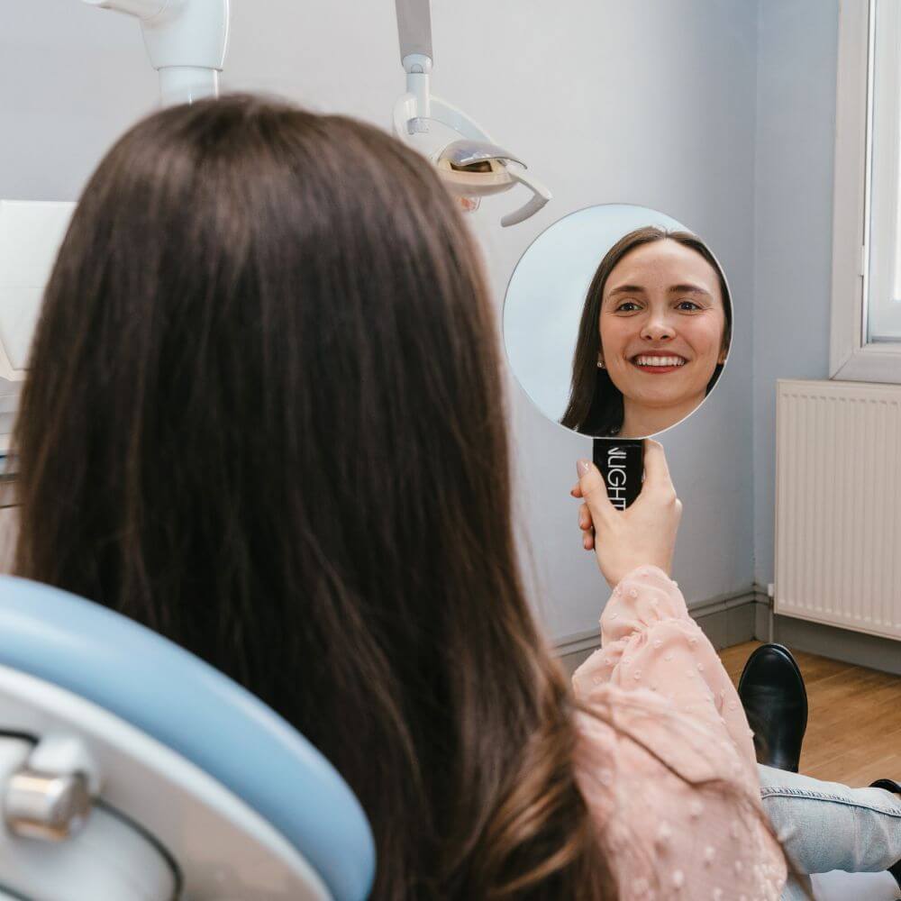 Happy patients seeing results at the dentist